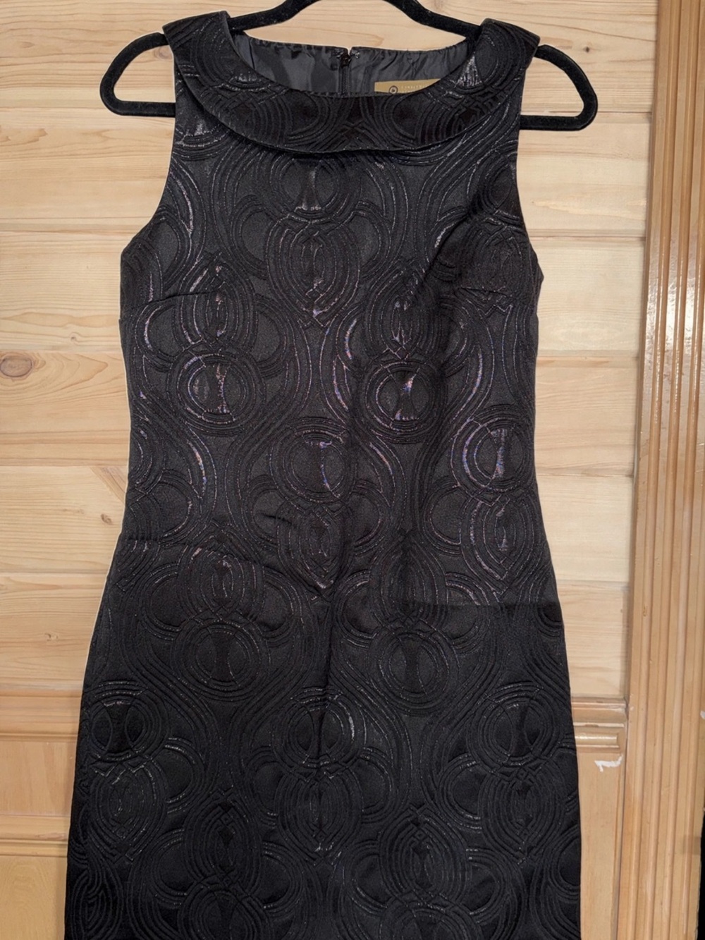 Sleeveless Black Midi Sheath Dress with Textured Circle Pattern